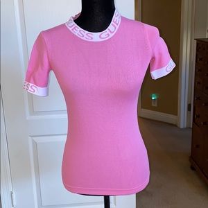 Stretchy shirt with guess logo on cuffs & neckline